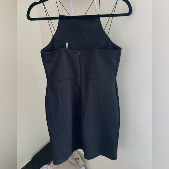 Black mini dress with cross straps - Picture 2 of 3
